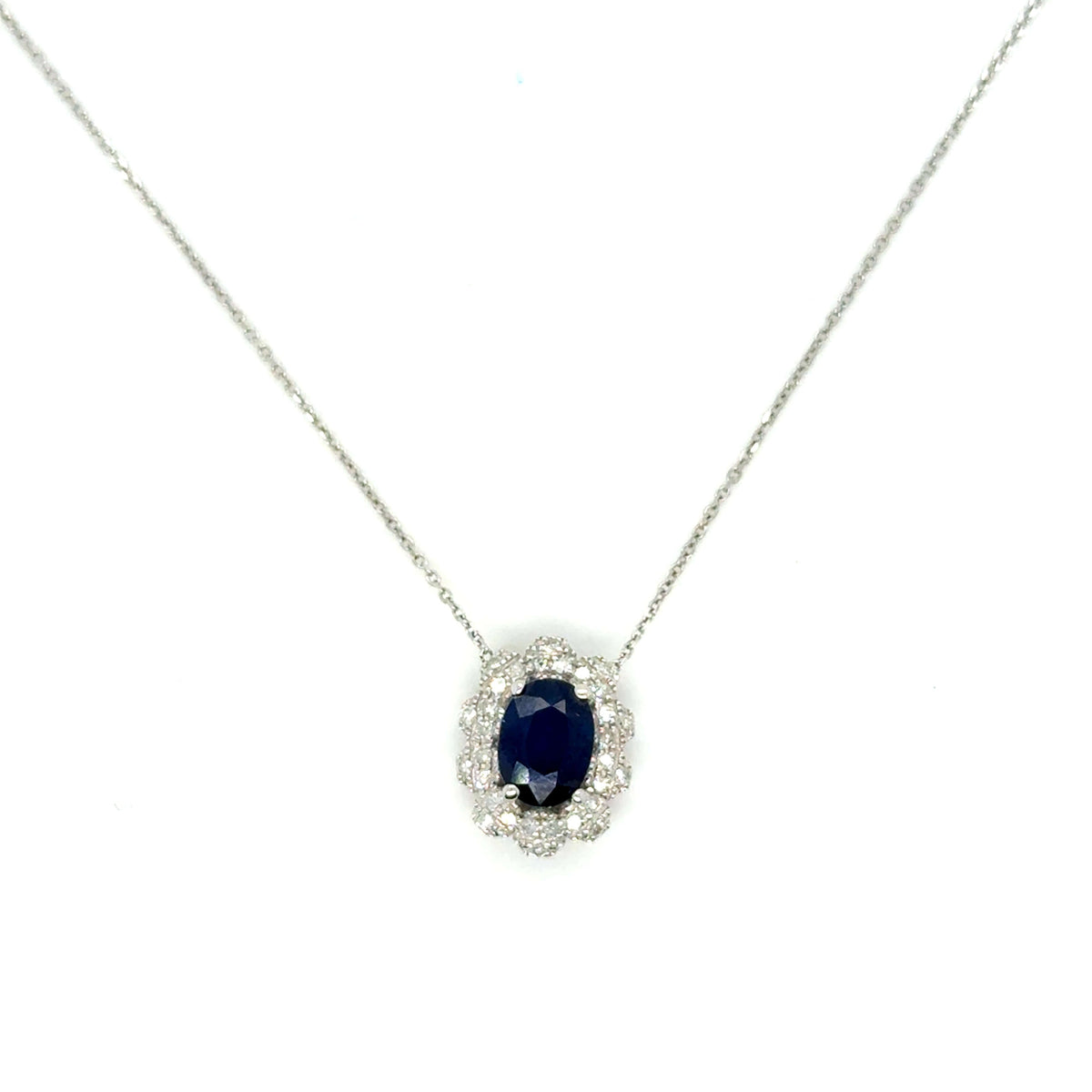 collier en or blanc 18K serti d'un saphir et de diamants taille brillant