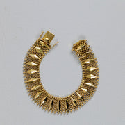 Bracelet manchette vintage en or jaune 18 carats à maille souple et losanges