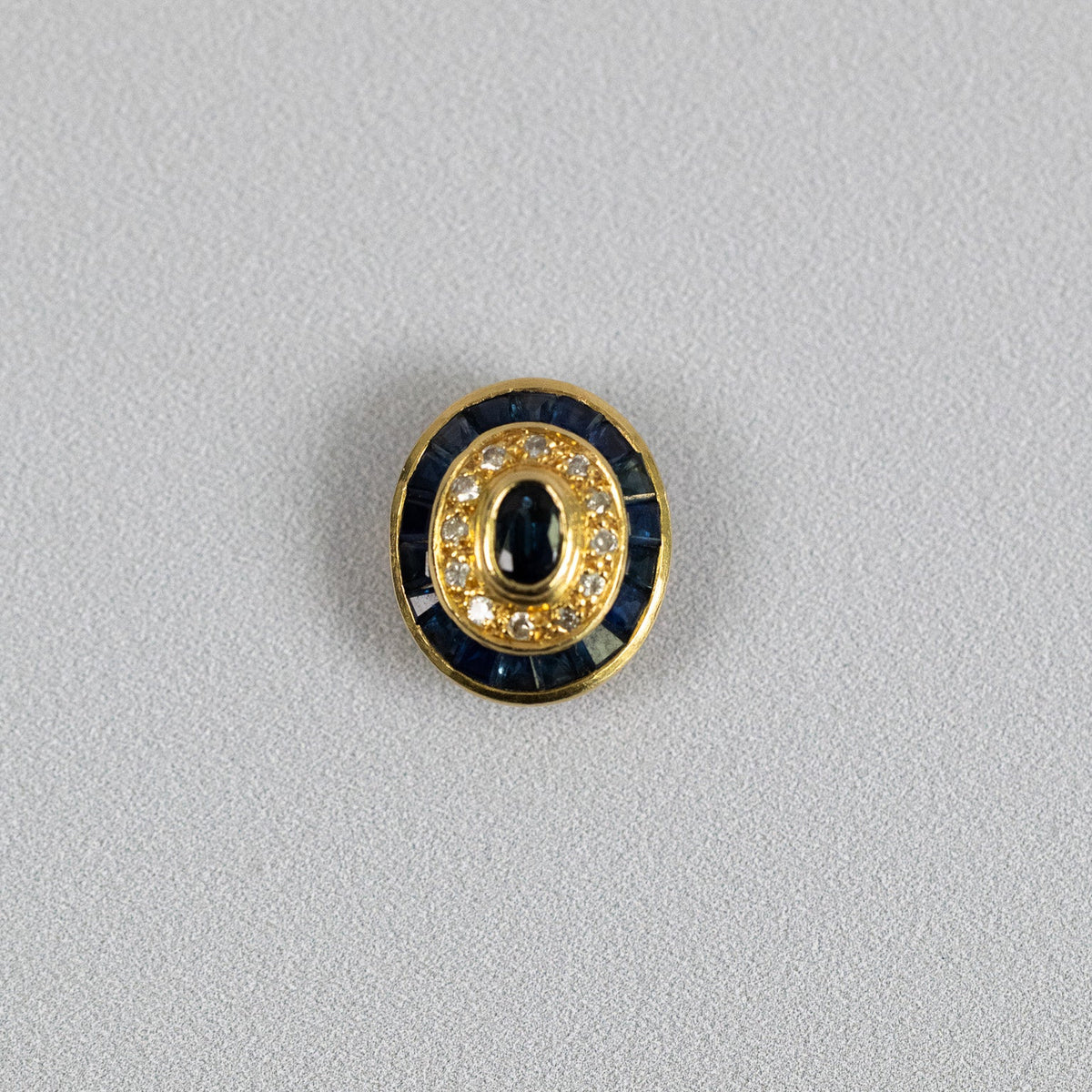 Pendentif ovale style Art Déco en or jaune 18 carats serti de saphirs et diamants