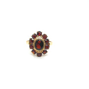Bague or jaune sertie de grenat vintage Occasion Seconde Main femme
