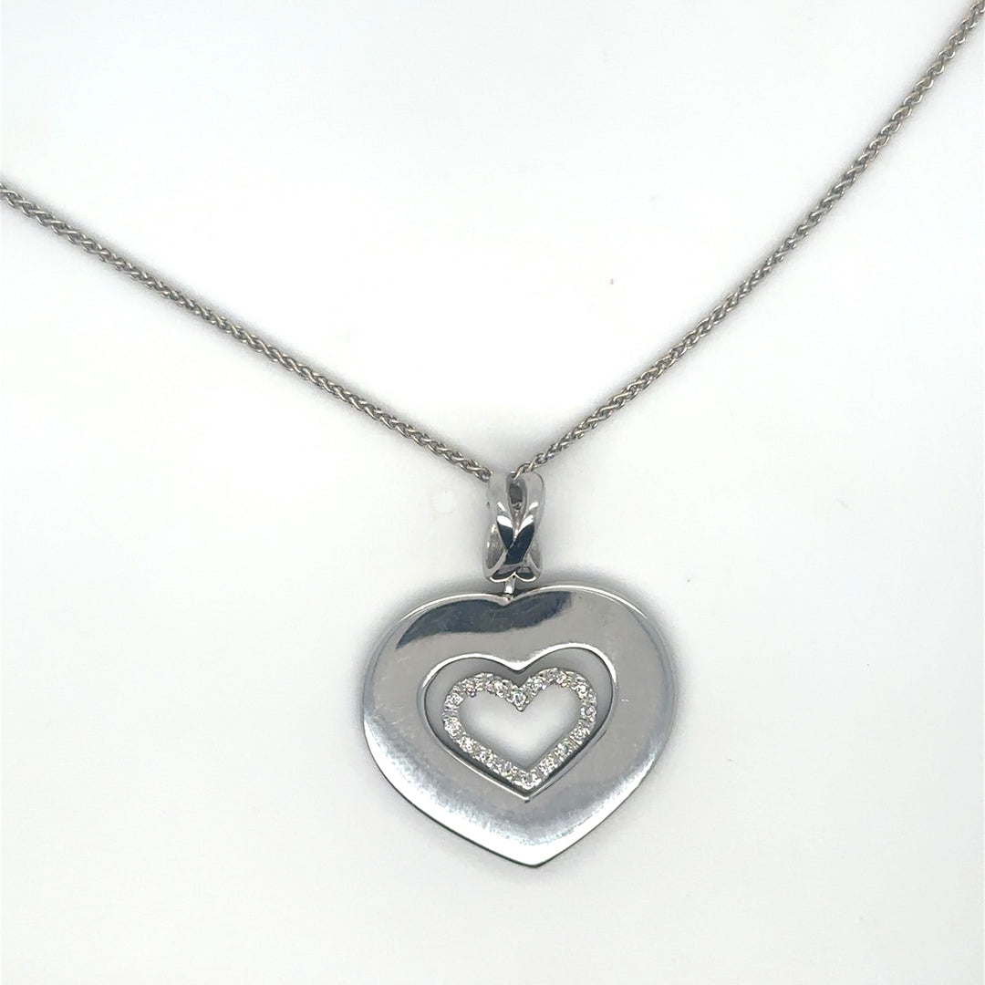 Collier avec pendentif cœur serti de diamants Occasion Seconde Main