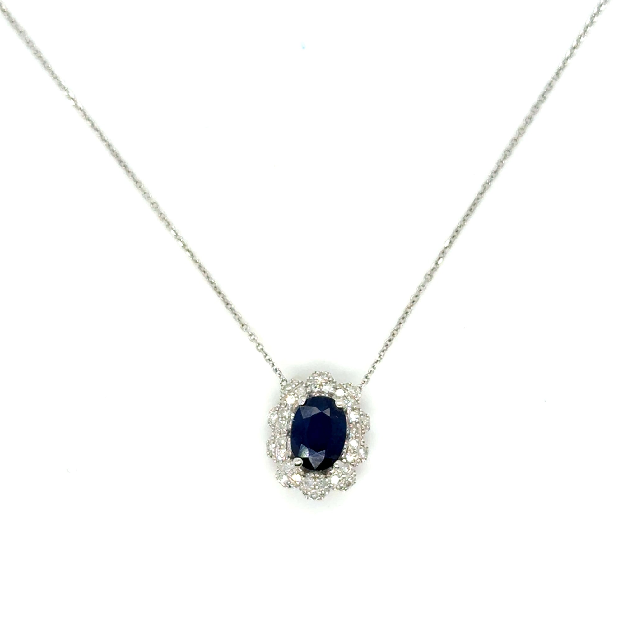 collier en or blanc 18K serti d'un saphir et de diamants taille brillant