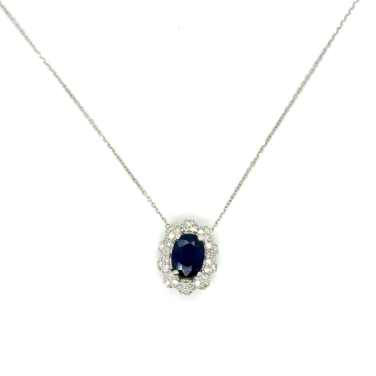 collier en or blanc 18K serti d'un saphir et de diamants taille brillant