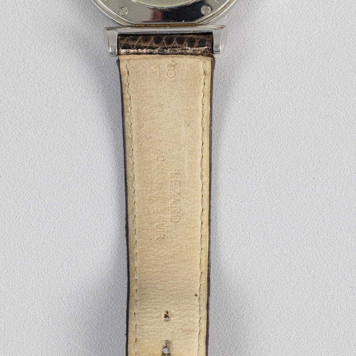 Montre Chopard Impériale acier et or rose sur bracelet lézard portée au poignet