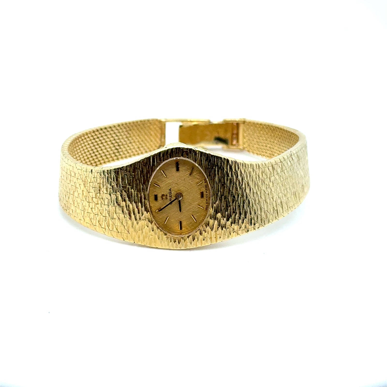 Montre signée OMEGA or jaune 18K vintage