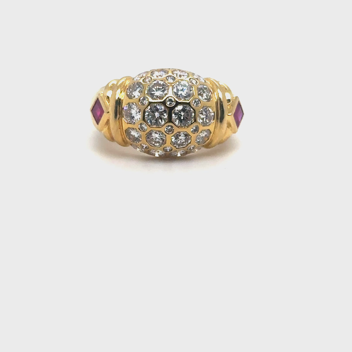 Load video: 18K Yellow Gold Ruby and Diamond Band Ring